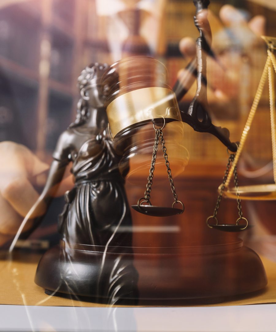 Scales of justice and gavel in a Clearwater law office